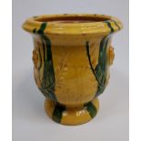 A Large antique Majolica plant pot. Designed in a yellow and green glaze. [31cm in height]