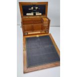 An Impressive Antique stationary travel box, Fitted interior drawers, slots, ink pots and leather