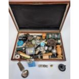 A Box containing a collectable odds. Small Cast iron bank, Treen, Spirit/ wine pourers etc