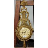 A Vintage Smiths wall clock fitted within a gilt regency style body.