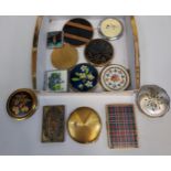 A Collection of various ladies compacts