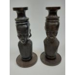 A Pair of hand carved African busts. [34cm in height]