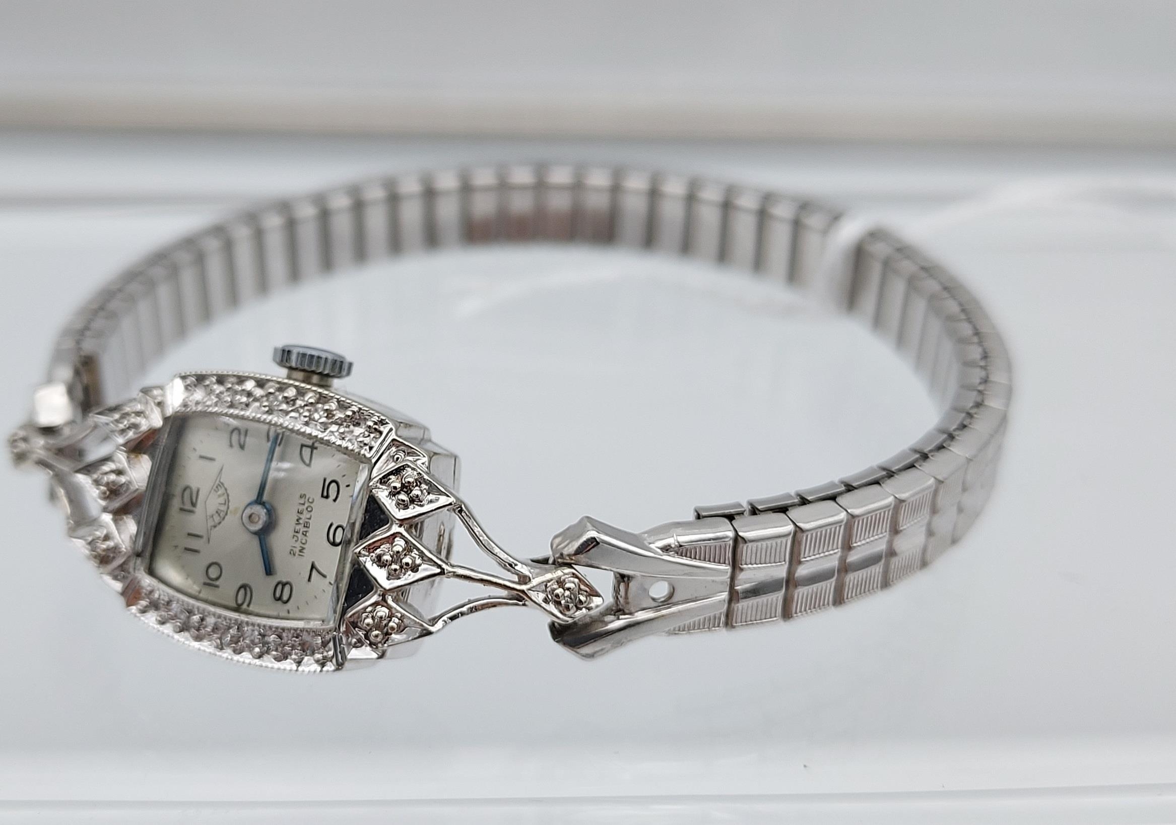 An Art Deco 14k white metal and diamond ladies wrist watch produced by Talis, 21 jewels Incabloc. - Image 3 of 4