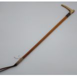 Antique riding crop, antler handle with a silver mount and Malacca shaft. [82cm in length]
