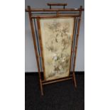 An Antique 19th century bamboo framed draught screen, Chinese/ Japanese silk embroidery panel. [