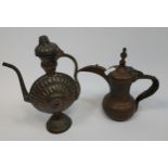 Two antique Turkish copper coffee pots.