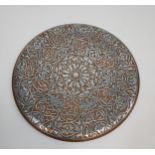 A 19th/ early 20th century Middle Eastern silver on copper wall plate/ charger. [40cm in diameter]