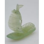 A Chinese hand carved jade junk boat sculpture.
