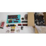 A Collection of various Hornby train models and accessories to include Hogwart's castle Loco, Tender