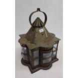 An antique Turkish style hanging lantern. Of square form with projecting demi lune sections,