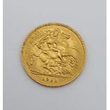 1911 Half gold sovereign.