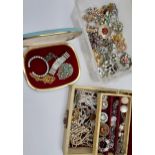 A collection of vintage costume jewellery to include Scottish plaid brooch, brooches, bracelets