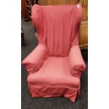 A Heavy Georgian/ Victorian gull wing arm chair. Fitted with a red material cover. Horse hair