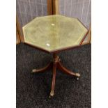 Antique lamp table, hexagonal top with green leather surface beneath glass, supported on a turned