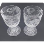 A Pair of antique etched red wine goblets, etched with cherubs, ribbons and foliage. [13.5cm in