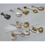 A Selection of caddy spoons to include Gilt foreign silver marked spoon in a shell form