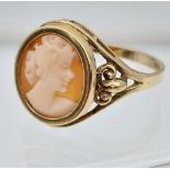 A 9ct gold and carved cameo ring. [2.57grams] [Ring size 0]