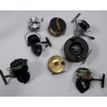 A Selection of various fishing reels to include spinning, fly and sea reels