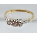 18ct gold and Platinum diamond ring. [Ring size K] [2.16 Grams]