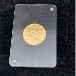 A 1916 Gold 20 Kroner coin with presentation box