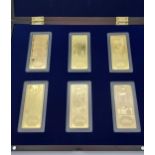 A Boxed set of 6 gold plated bank notes of Great Britain Ingots.