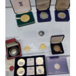 A Collection of mint coins to include silver Winston Churchill half crown coin, Silver, gold and