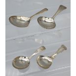 A Lot of four Georgian silver caddy spoons. [46.18grams]
