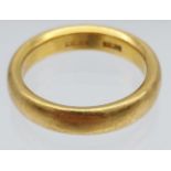 A Heavy 22ct gold wedding band. [10.17grams] [Ring size P]