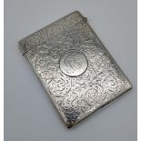 A Birmingham silver ornate card case. [split to the lid] [86.38grams] [9.5x7cm]