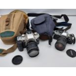 Canon EOS 50E Camera and bag, together with an Olympus OM 10 Camera and carry bag