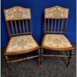 Pair of Edwardian low chairs, upholstered cushion and slatted back support above an upholstered