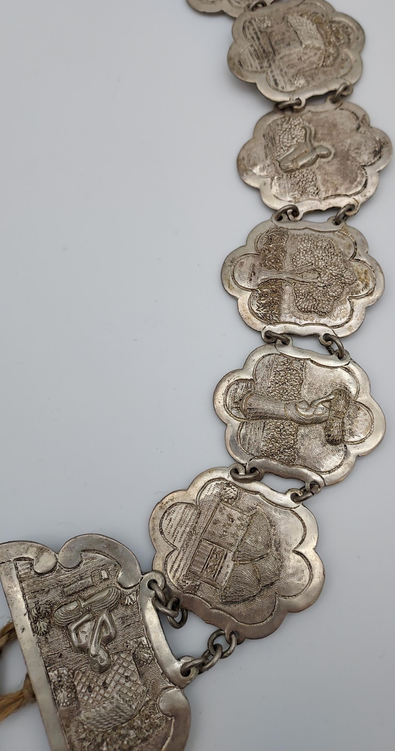 An Indian ornate silver belt. [206.90grams] - Image 3 of 7