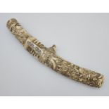 A 19th/ early 20th century highly decorative Japanese Tanto. Carved from ivory. Saya has a smaller