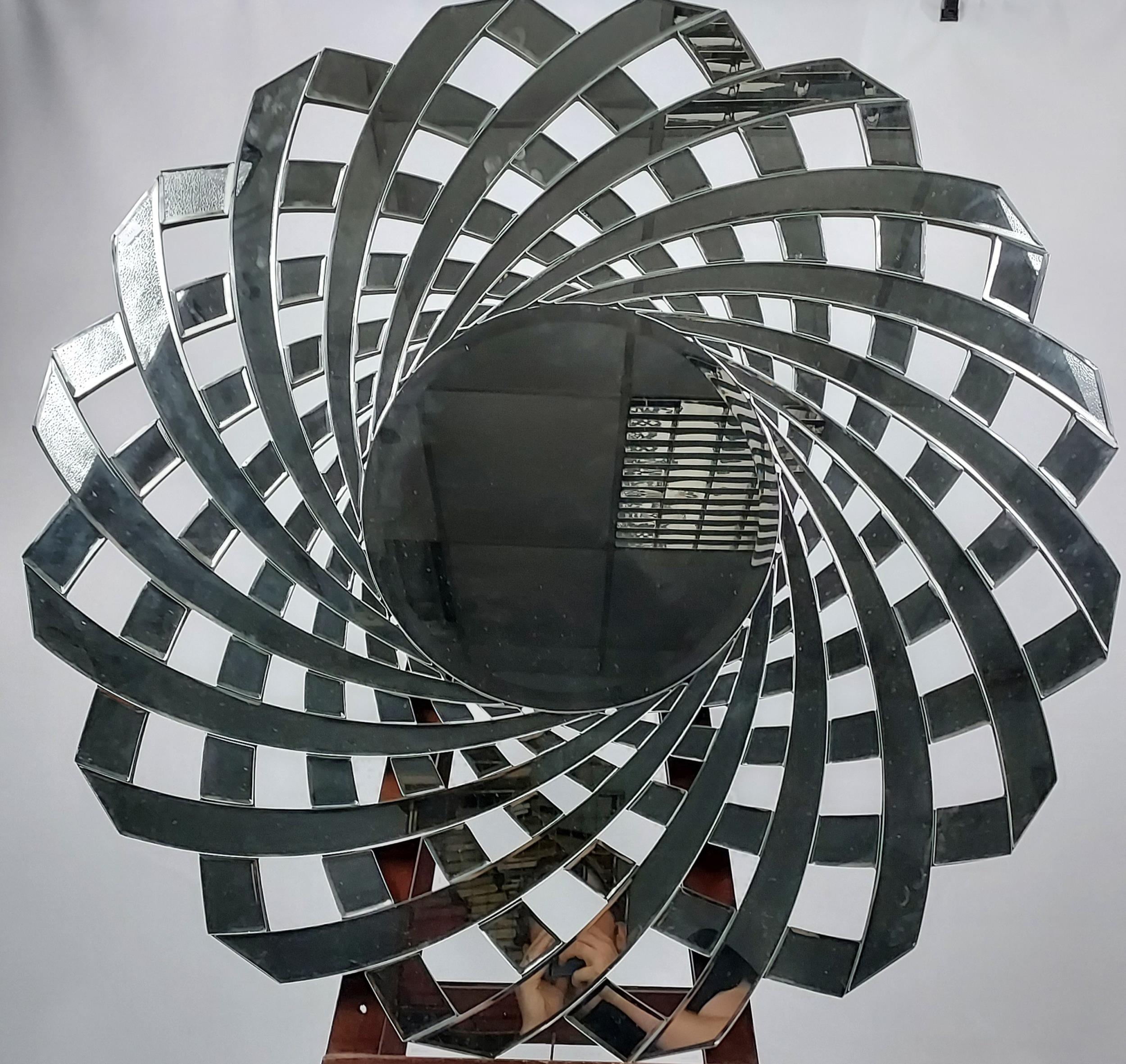 A Large contemporary abstract mirror. [100cm in diameter]