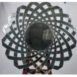A Large contemporary abstract mirror. [100cm in diameter]