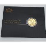 A 2017 Full gold sovereign with card.