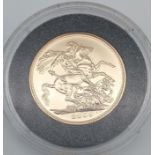 A 2009 Full gold sovereign.