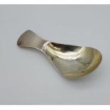 A Dublin Silver caddy spoon. Maker JS. [9.64GRAMS]