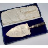 An Edinburgh Silver and wood presentation trowel with a fitted box. Engraved 'Presented to Sir Henry