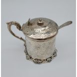 A Victorian London silver ornate preserve pot with blue liner and Edinburgh silver spoon. [147.