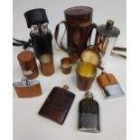 A Collection of antique silver pleated and leather hip flasks, drinking cups with leather holders