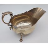 A Chester silver three foot gravy boat. [208.74grams]