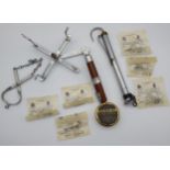 A Selection of Hardy Bros. fishing equipment to include gaff, red deer fat, line dryer and various