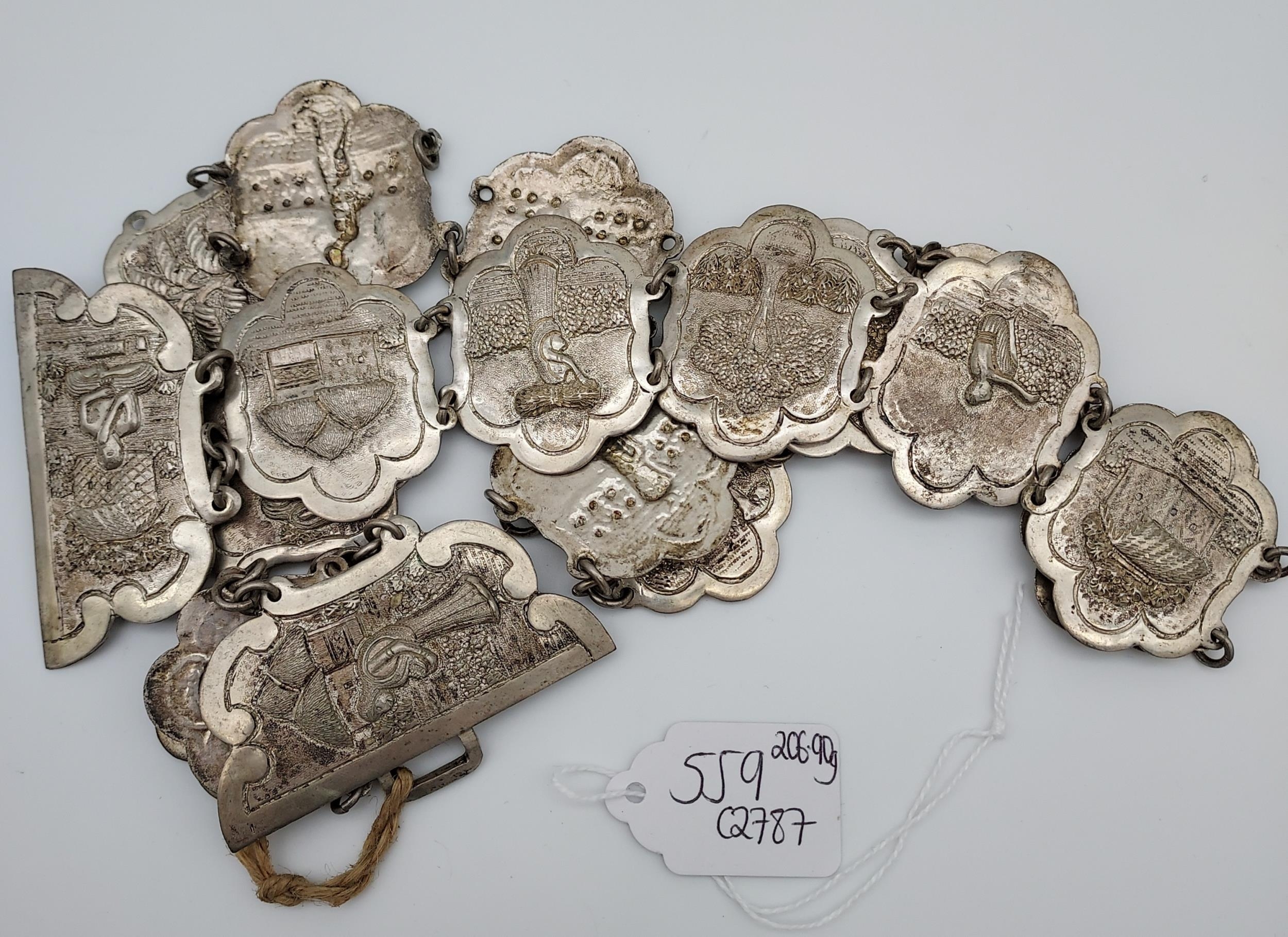 An Indian ornate silver belt. [206.90grams] - Image 7 of 7