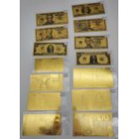 A Collection of gold plated bank notes