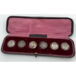 A boxed set of 6 Birmingham silver ornate buttons.