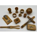 A Selection of Mauchline ware to include Crucifix, purse, bobbin and various sized boxes.