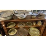 Three shelves of Tibetan and middle east items to include wall chargers, spice box, incense