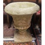 A Pair of heavy garden urn planters.