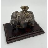 Antique Indian silver elephant sculpture burner lamp. Sat upon a rose wood base. [7.5x8.5cm-
